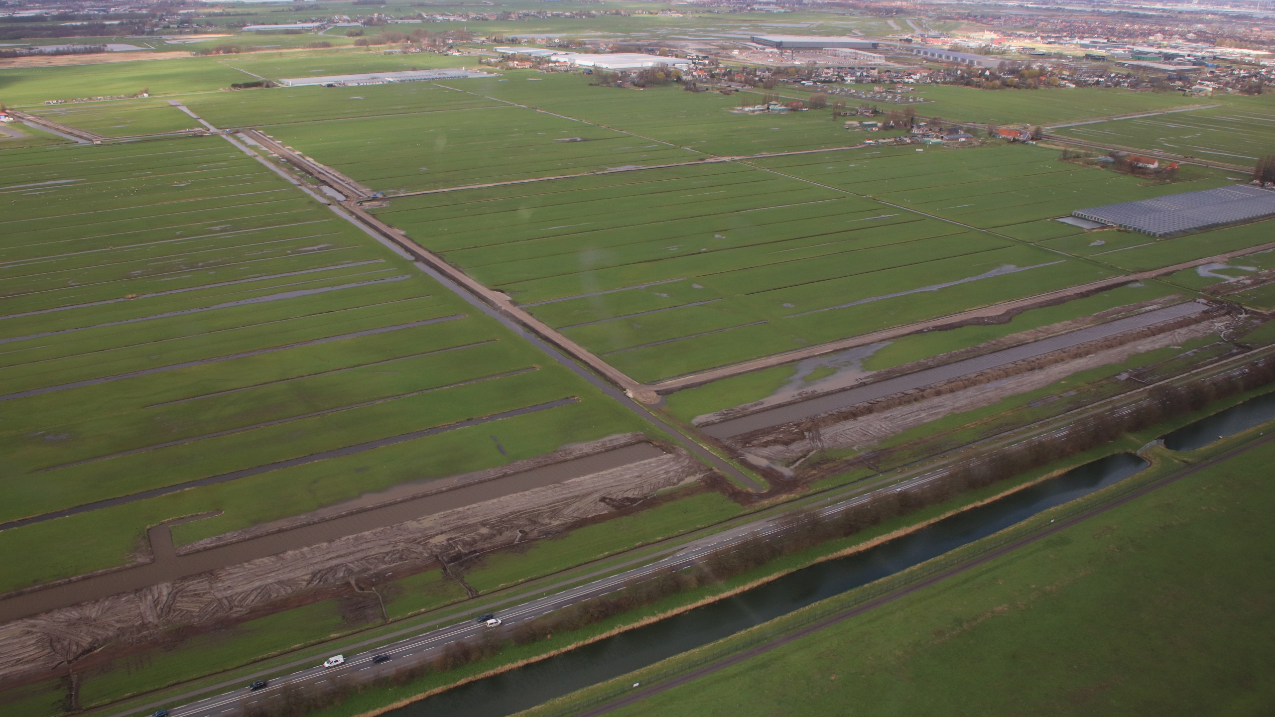 Luchtfoto van werkzaamheden door Ploegam bij de Polder Schieveen Zuid en Schiebroeksepolder