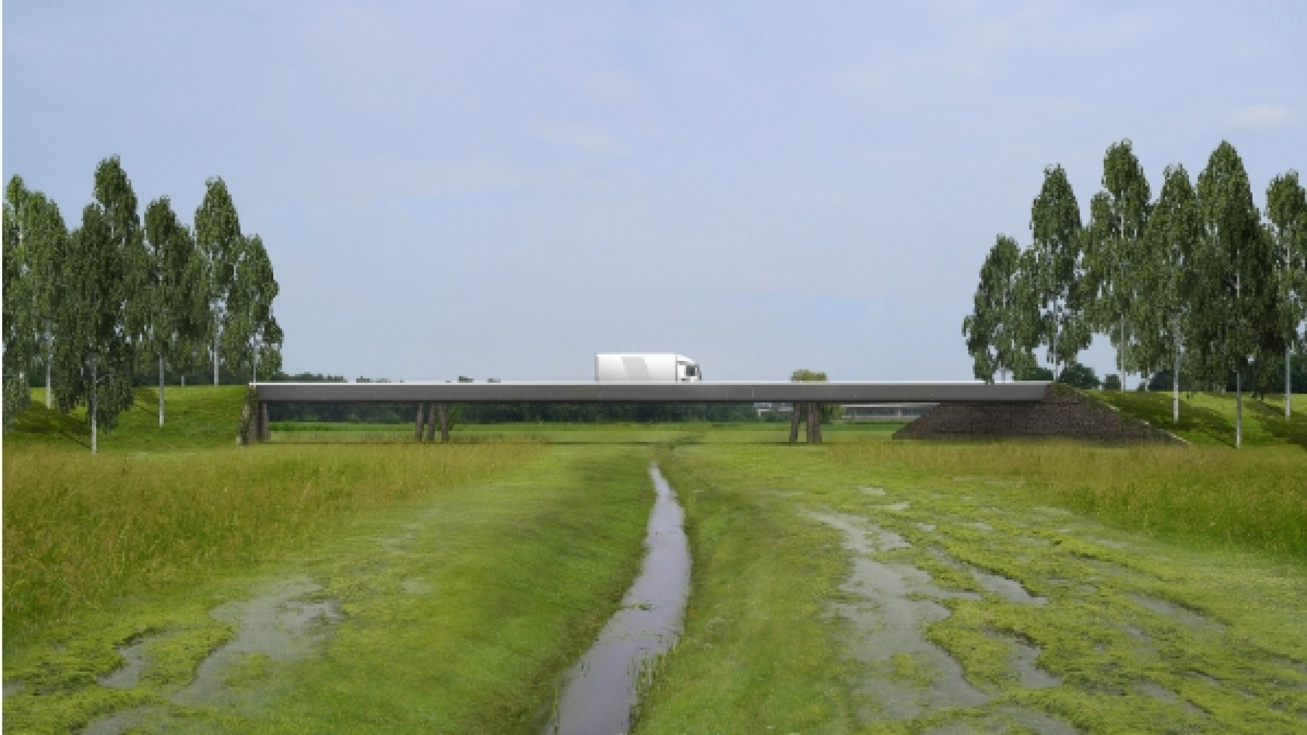 Viaduct met vrachtwagen over natuurgebied met beek en gras
